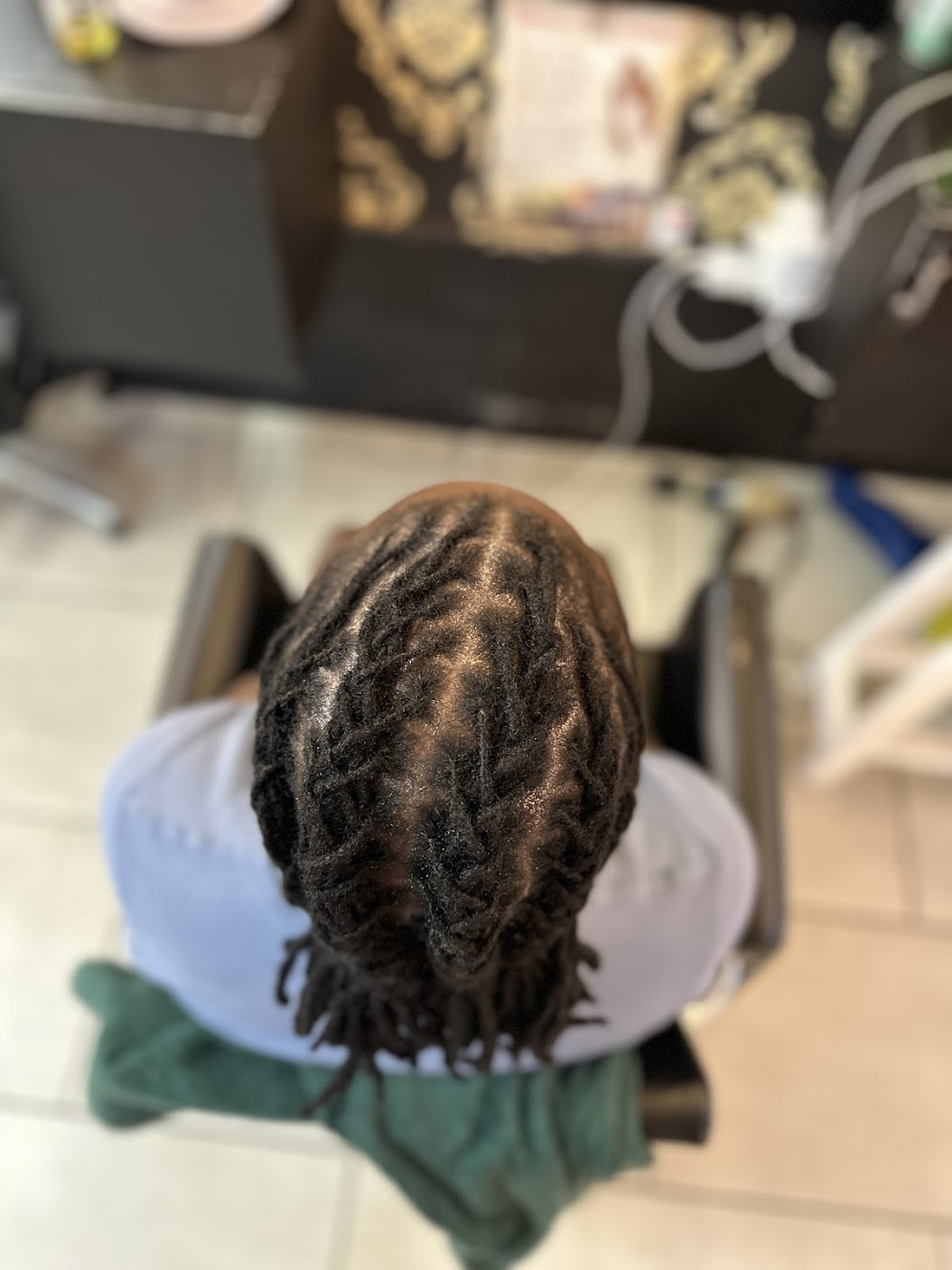 Client wearing styled dreadlocks